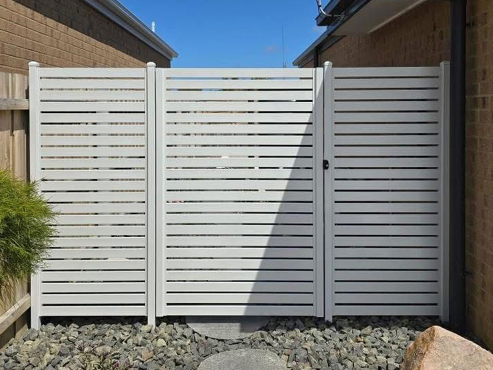 Plain white back gate installation in South Eastern Suburbs, Melbourne